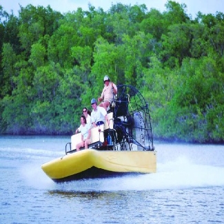 Man_Driving_Tourists_On_His_Airboat_in_the_Everglades
